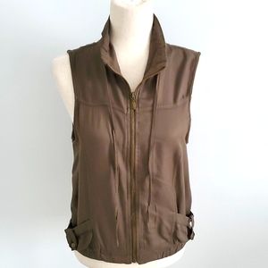 Angel Kiss sleeveless women’s  blouse new with tags Size small zippered front.